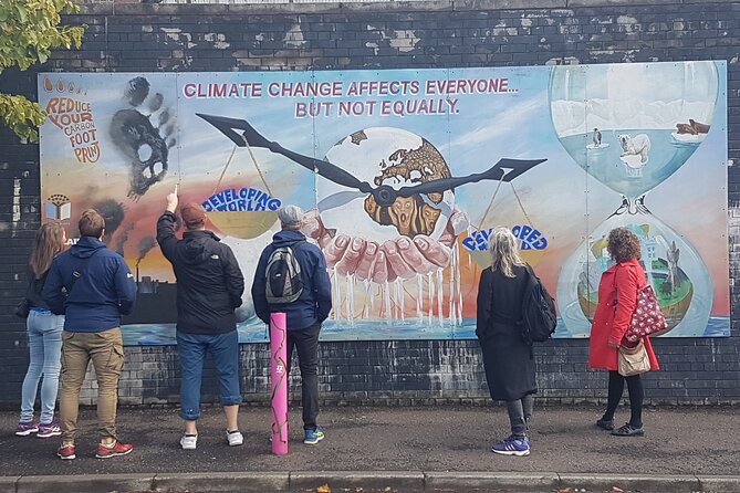 Belfast Troubles Murals Street Art and Peace Wall Walking Tour - Divis Street International Mural Wall: global causes with local meaning