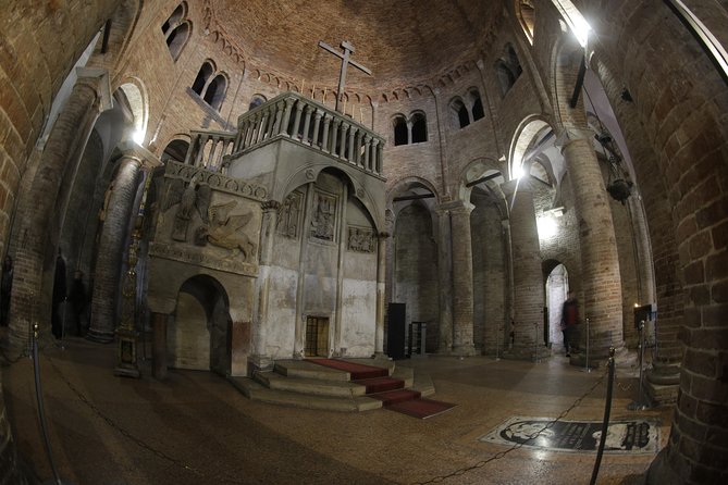 Bologna historical art walking tour with hidden gems and tastings - Santo Stefano complex: Roman roots, Dante’s cloister, and animal-faced capitals