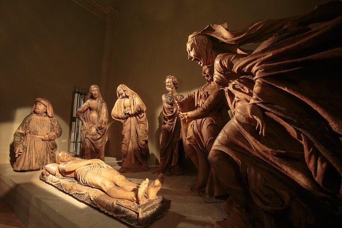 Bologna historical art walking tour with hidden gems and tastings - Palazzo d’Accursio: frescoed rooms, Bramante’s horse stairs, and an earthquake story