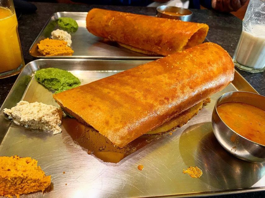 Delhi Street Art Tour: Explore the Murals & Visit a Stepwell - Starting at Golden Bakery and getting into the lanes fast
