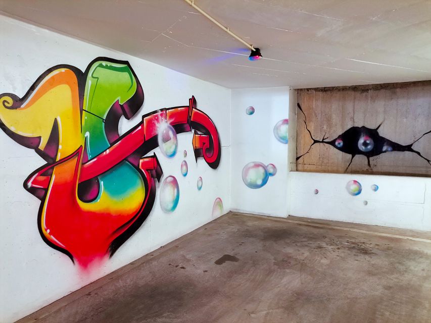 Lisbon: 2-Hour Street Art Photo Tour - The walking rhythm: Lisbon hills, stops for photos, and Tagus views