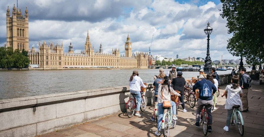 London: Landmarks & Secrets Bike Tour with Pub & Street Art - Rain-proof touring, helmets/tweed, and smart packing for 3.5 hours