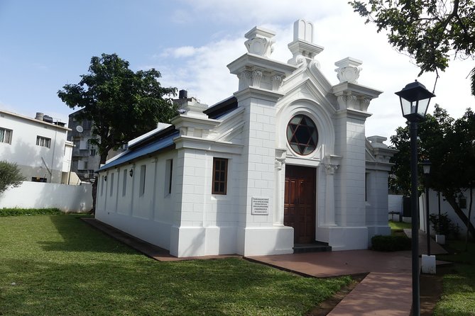 Maputo Art Walking Tour - Vila Algarve: the “Português suave” façade with a dark basement story