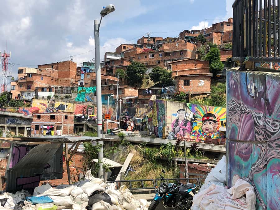 Medellín: Private Comuna 13 Street Art Tour - Cable car ride: views, yes, but also context