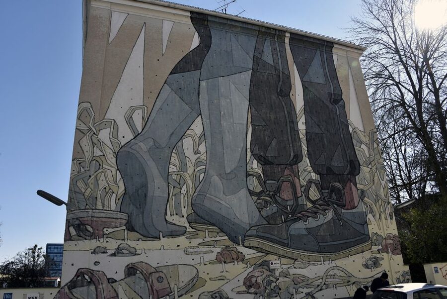 Munich: Street Art Bike Tour - Slaughterhouse district and the boat pause near a railway bridge