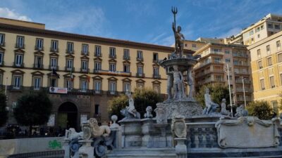 Naples Essentials: Monuments, Local Life & Street Art - Royal Palace exterior to San Carlo: history with names and attitude