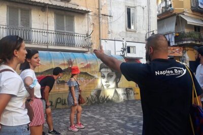 Naples Spanish Quarters Walking Tour Street Art, Folklore & Sweet - Via Toledo: where Spanish planning meets modern Naples