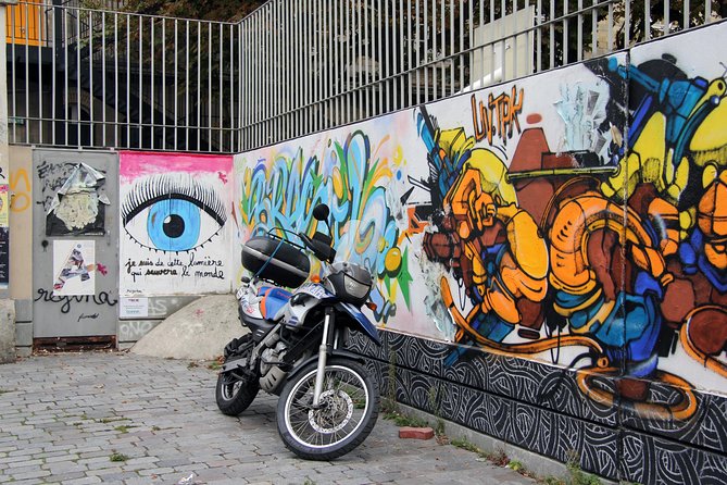 Paris Off the Beaten Path Street Art Walking Tour - Stop 1 in Belleville: Murals, Mosaics, and the Artists’ Clues