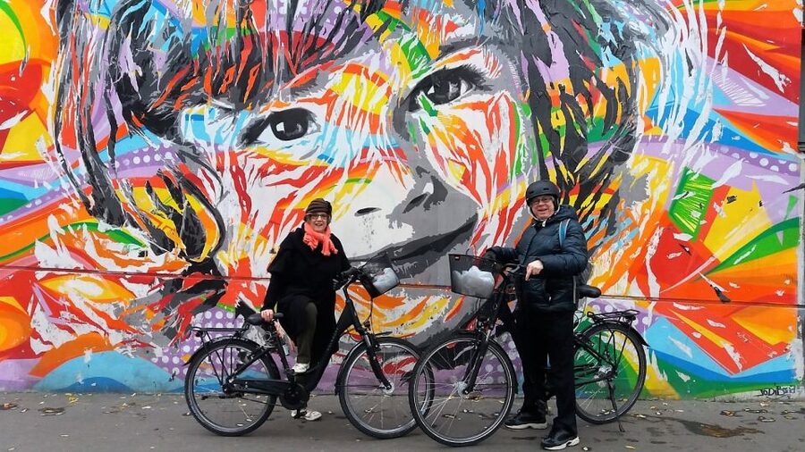 Paris: Street Art Open-Air Museum Bike Tour - First stop energy: 40-meter frescoes and why size changes how you see art
