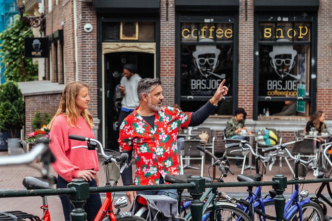 Private City Kickstart Tour: Amsterdam - Dam Square: Your Loud, Historic Anchor in Amsterdam