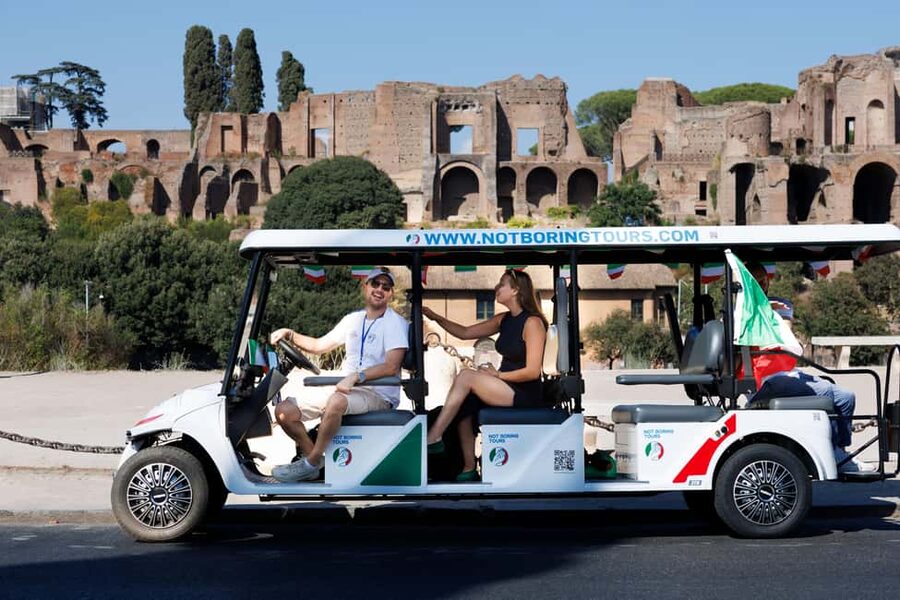Rome: Fun Golf Cart Tour with Music and Gelato - The Colosseum stop: photos, stories, and a real time buffer