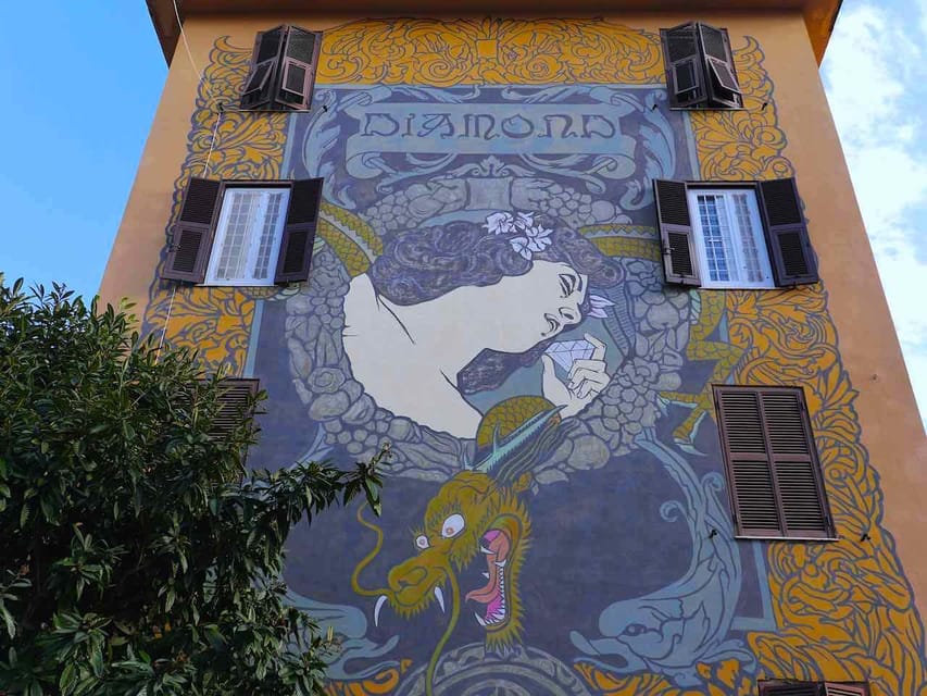 Rome street art tour: off the beaten path with a local guide - Garbatella murals: monuments, planning, and why the streets feel different