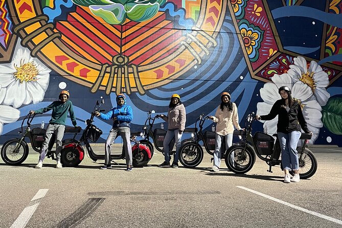 Smart Tour: Dallas Mural E-Bike Tour - Stop 5: 2206 Elm St and the Adrian Torres 42 Murals wall