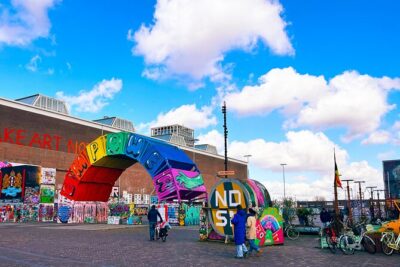 Street Art Walking Tour, private local Dutch guide - Amsterdam Central Station: a five-minute street art wink