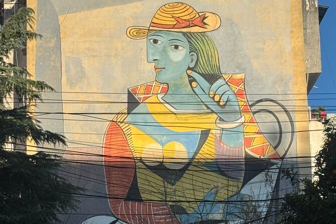 Tirana Mural Bike Tour: Street Art, Culture & Photography Stops - Clothespin by Sizmikazot: surreal humor with a symbol hiding inside